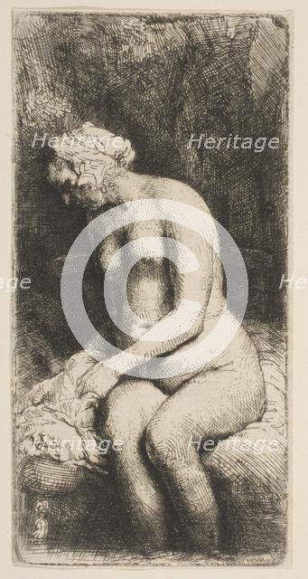 Woman Bathing Her Feet at a Brook, 1658. Creator: Rembrandt Harmensz van Rijn.