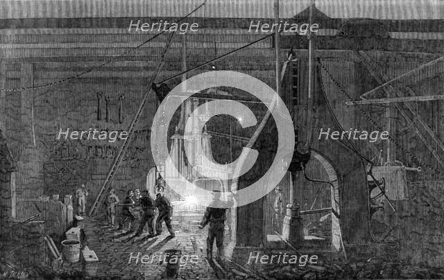 Stephenson's locomotive manufactory at Newcastle-On-Tyne: the steam-hammer, 1864. Creator: Mason Jackson.
