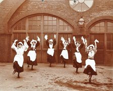 Girls morris dancing in playground, Thomas Street Girls School, Limehouse, Stepney, London, 1908. Artist: Unknown.