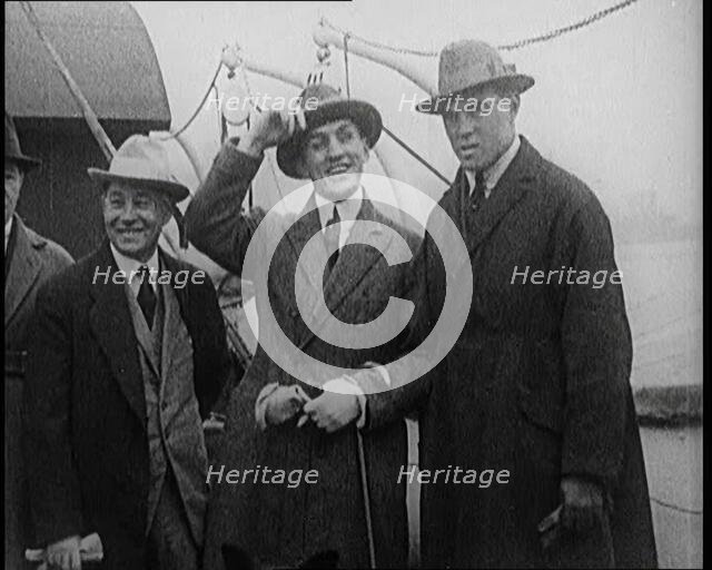 George Carpentier With Associates on the Deck of a Ship, 1921. Creator: British Pathe Ltd.