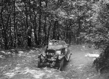 Windsor of CC Bliss competing in the B&HMC Brighton-Beer Trial, Fingle Bridge Hill, Devon, 1934. Artist: Bill Brunell.