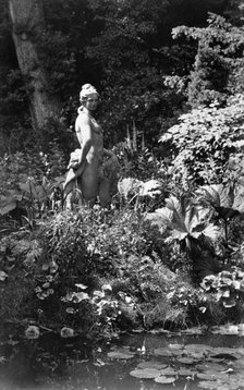 Statue by the pond, Park Place, Remenham, Berkshire, c1900. Creator: Farnham Maxwell Lyte.