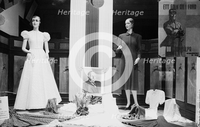 Clothes shop window with rwo mannequins, Malmö, Sweden, 1940. Artist: Unknown