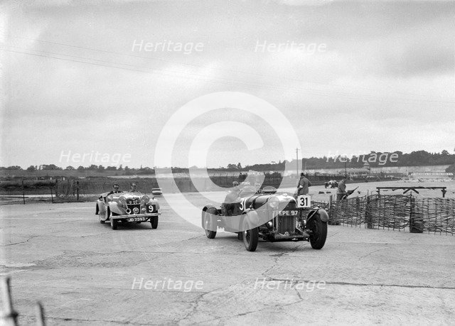 AP Watson's Lagonda and AS Lusty's Riley Lynx at the chicane, JCC Members Day, Brooklands, 1939. Artist: Bill Brunell.