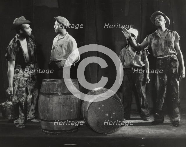 Gus Smith as Forty-Four explains the situation to his co-workers, 1936. Creator: Milton Meltzer.