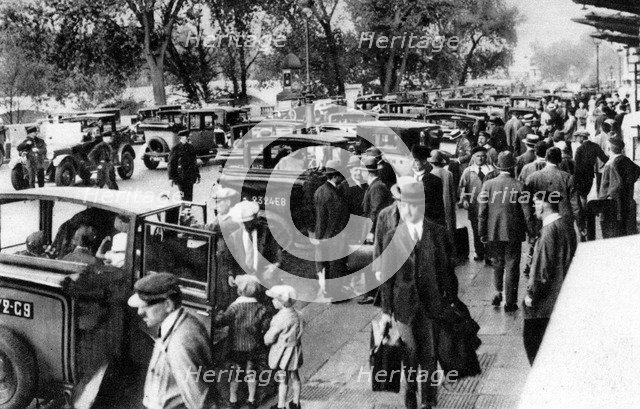 Crowds in front of the station, Orsay, Paris, 1931. Artist: Ernest Flammarion