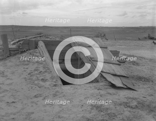 Storm cellar on the Texas plains, West Texas Panhandle, 1937. Creator: Dorothea Lange.