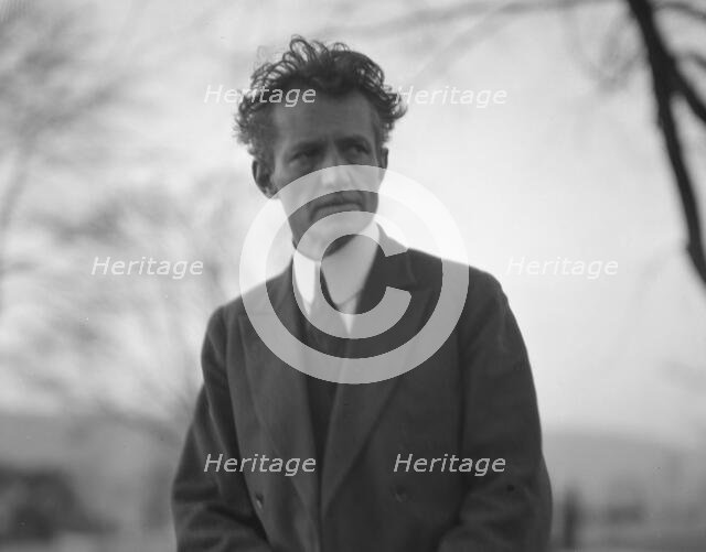 Portrait photograph of Arnold Genthe taken outdoors, between 1911 and 1942. Creator: Arnold Genthe.