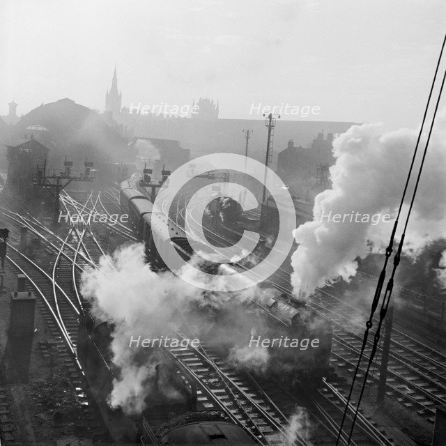 Steam trains at King's Cross, London, 1946-1969. Artist: John Gay