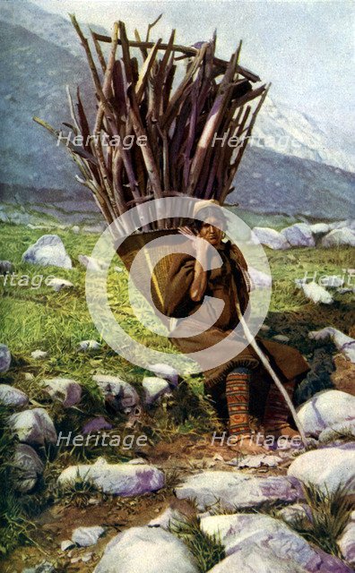 Woman with a load of wood, Afghanistan, c1924.Artist: Colonel JG Edwards