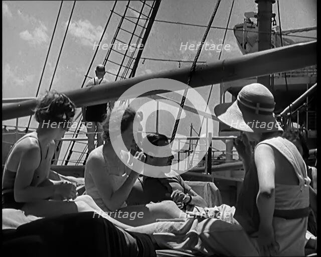 A Group of People on the Deck of a Cruise Liner at Sea, 1931. Creator: British Pathe Ltd.