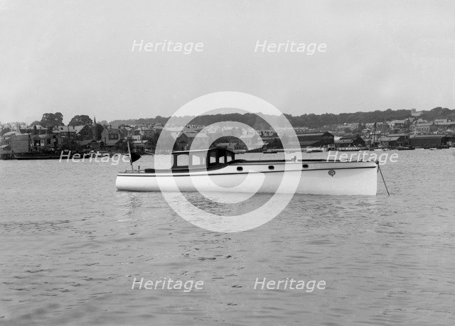 Wolseley motor launch at anchor, 1914. Creator: Kirk & Sons of Cowes.