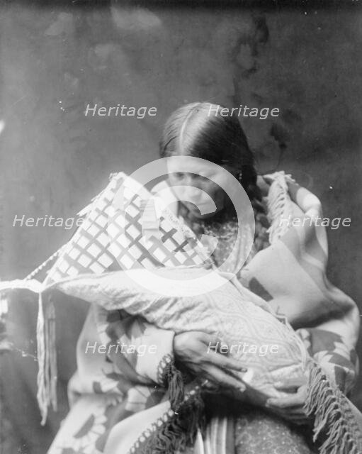 Cheyenne mother and child, c1905. Creator: Edward Sheriff Curtis.
