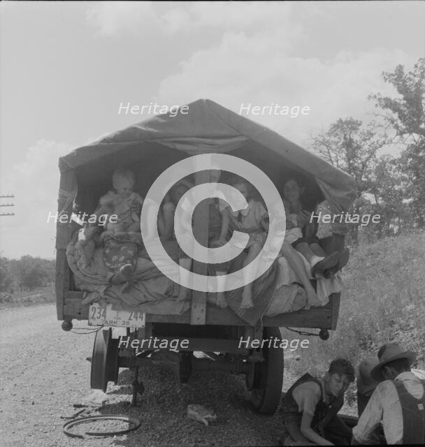 On highway no. 1 of the "OK" state near Webbers Falls, Muskogee County, Oklahoma, 1938. Creator: Dorothea Lange.