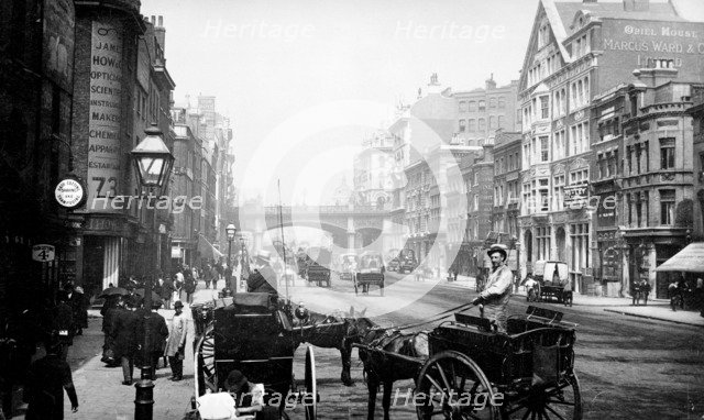 People walking down Farringdon Street looking towards Holborn Viaduct, City of London, 1890. Artist: Unknown