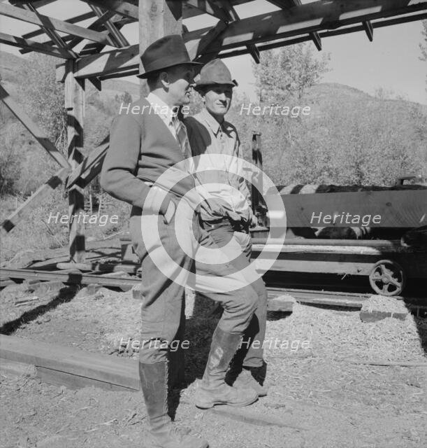 Possibly: Men working in mill, Ola self-help sawmill co-op, Gem County, Idaho, 1939. Creator: Dorothea Lange.