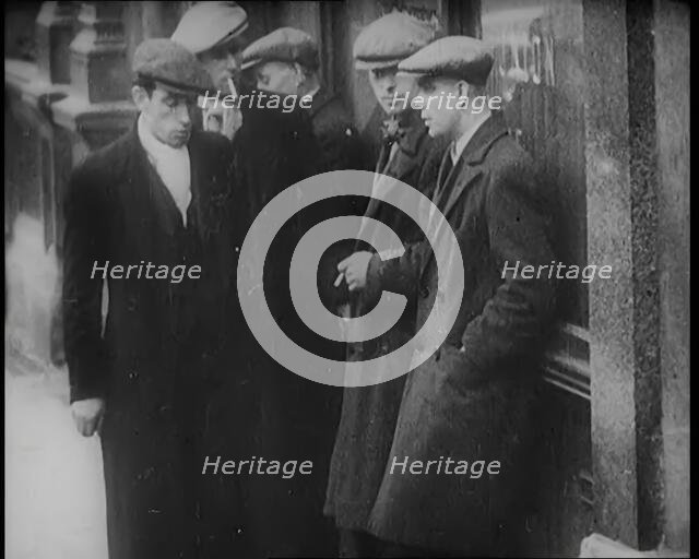 Male Civilians Standing in the Streets, 1926. Creator: British Pathe Ltd.