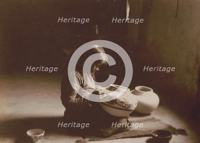 Nunipayo [i.e. Nampeyo] decorating pottery, c1900. Creator: Edward Sheriff Curtis.