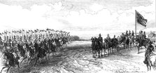 Review in Phoenix Park: the 12th Lancers galloping past, 1868. Creator: C. R..