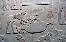 Egyptian relief of the cutting up of a carcass. Artist: Unknown