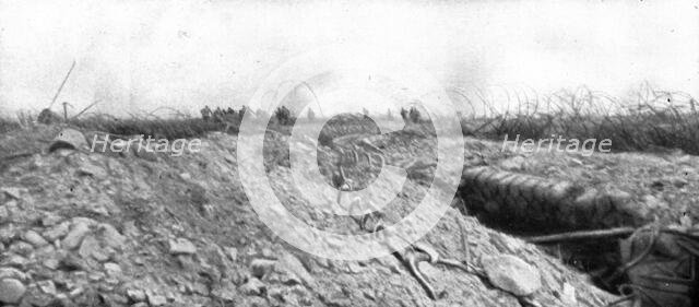 How to make a surprise attack; Crossing our network of razor wires.., 1917. Creator: Unknown.