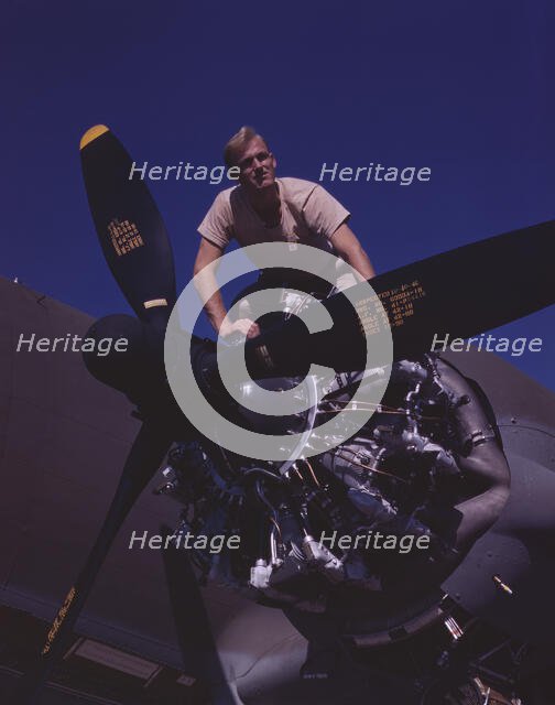 Flexible performance of C-47 transport planes is due in part to their..., Long Beach, Calif., 1942. Creator: Alfred T Palmer.