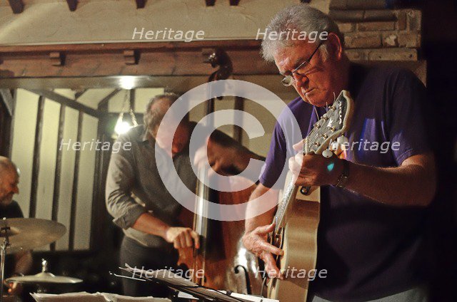 Jim Mullen, Scottish jazz guitarist, The Woodman, Ide Hill, Kent, 2012. Artist: Brian O'Connor.