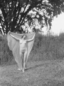 Olson, Margaret, Miss, standing outdoors, 1924 July. Creator: Arnold Genthe.