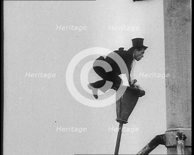 A Man on a Bendy Lamppost, 1930s. Creator: British Pathe Ltd.