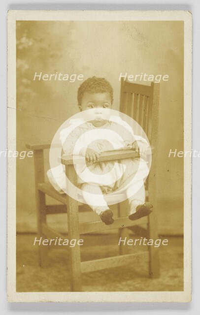 Photographic postcard of unidentified child, 1917-1930. Creator: Unknown.