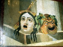 Theatrical masks of tragedy and comedy depicted in a Roman mosaic. Artist: Unknown