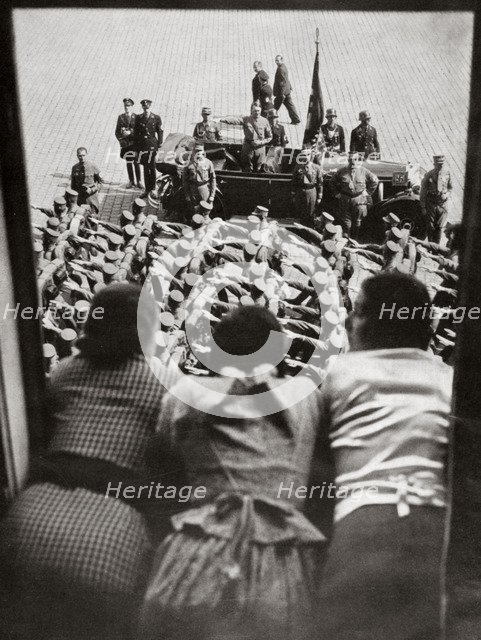 Three girls watching the traditional parade of SA stormtroopers, Nuremberg, Germany, c1923-1938. Artist: Unknown
