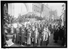 Parade with President Woodrow Wilson and Mrs. Wilson on reviewing stand, between 1910 and 1914. Creator: Harris & Ewing.