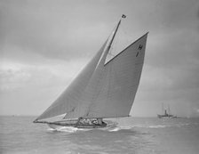 The 8 Metre class yacht 'Norman' (H1) sailing close-hauled, 1911. Creator: Kirk & Sons of Cowes.