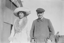 Mrs. Craig Biddle and J.A. Armstrong walking together, 1910. Creator: Bain News Service.