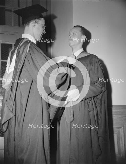 Young men preparing to receive degrees from Howard University, Washington, D.C, 1942. Creator: Gordon Parks.