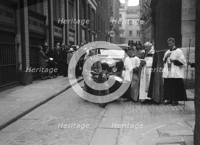 600 cc Douglas motorcycle combination and a Morris Minor at a motor vehicle blessing ceremony. Artist: Bill Brunell.