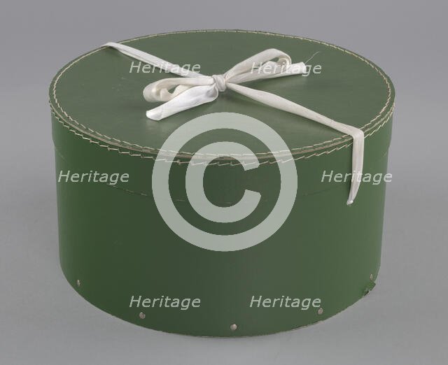 Green circular hatbox with lid from Mae's Millinery Shop, 1941-1994. Creator: Unknown.