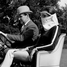 Patrick Macnee & Diana Rigg in 1905 Vauxhall filming the Avengers at Beaulieu 1966. Creator: Unknown.