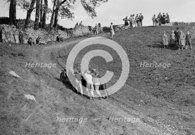 MG M type receiving a push up Litton Slack at the MCC Sporting Trial, Derbyshire, 1930. Artist: Bill Brunell.