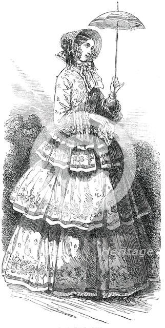 Paris Fashions for August - Promenade Dress, 1850. Creator: Unknown.
