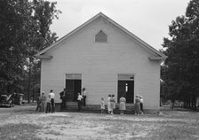 Possibly: Congregation entering church, Wheeley's Church, Person County, North Carolina, 1939. Creator: Dorothea Lange.