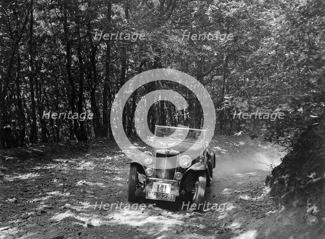 MG NA competing in the B&HMC Brighton-Beer Trial, Fingle Bridge Hill, Devon, 1934. Artist: Bill Brunell.