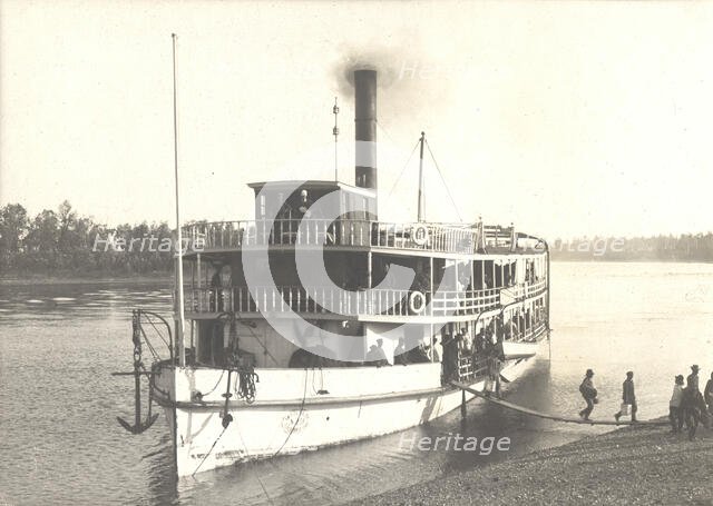 Disembarkation of passengers from the steamship "Russian" on the shore near the...Ovsyanki, 1909. Creator: Vladimir Ivanovich Fedorov.