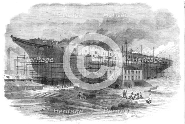 Building the great steam-frigate "Warrior" at the Thames Ironworks, Blackwall, 1860. Creator: Smyth.