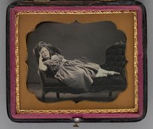 Untitled (portrait of a girl reclining on a chaise longue), 1855.  Creator: John Adams Whipple.
