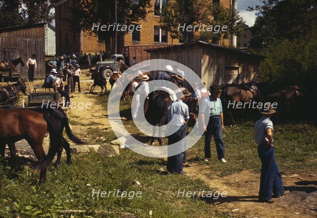 Mountaineers and farmers trading mules and horses on "Jockey St.,", Campton, Wolfe County, Ky., 1940 Creator: Marion Post Wolcott.