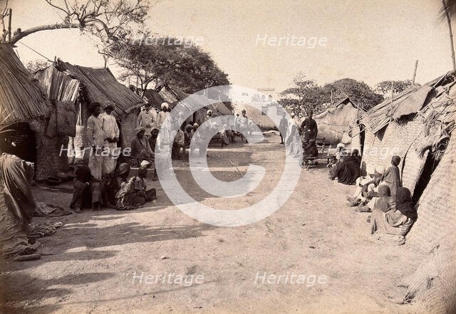 Pathway through the centre of a segregation camp during bubonic plague outbreak, Karachi, India,1897 Creator: Unknown.