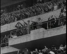 Adolf Hitler Addressing Crowds at the German Olympic Stadium, 1936. Creator: British Pathe Ltd.