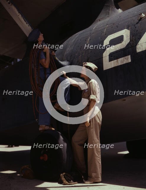 Women are contributing their skills to the nation's needs by keeping...Corpus Christi, Texas, 1942. Creator: Howard Hollem.